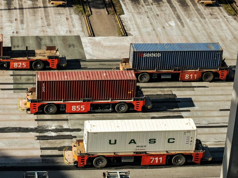 Container terminal with loaded trailers moving freight across the yard